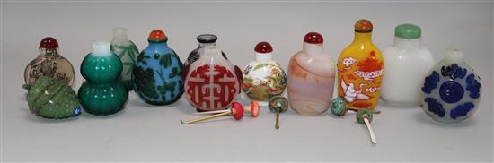 Eleven Chinese glass snuff bottles, mostly decorated in overlay